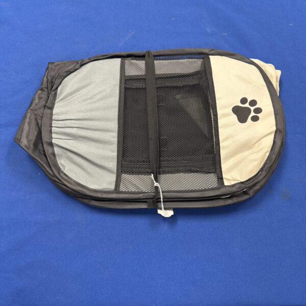 Collapsible folding cat playpen with mesh sides.
