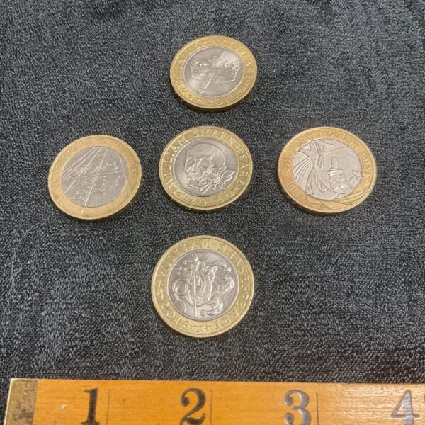 £2 coin collection featuring Olympic and Shakespeare designs.
