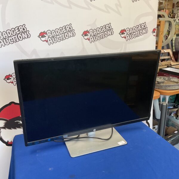 HP 32s monitor display screen for computer use.