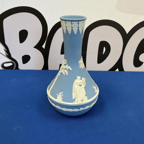 Antique Wedgwood Jasperware vase with blue background and neoclassical details.