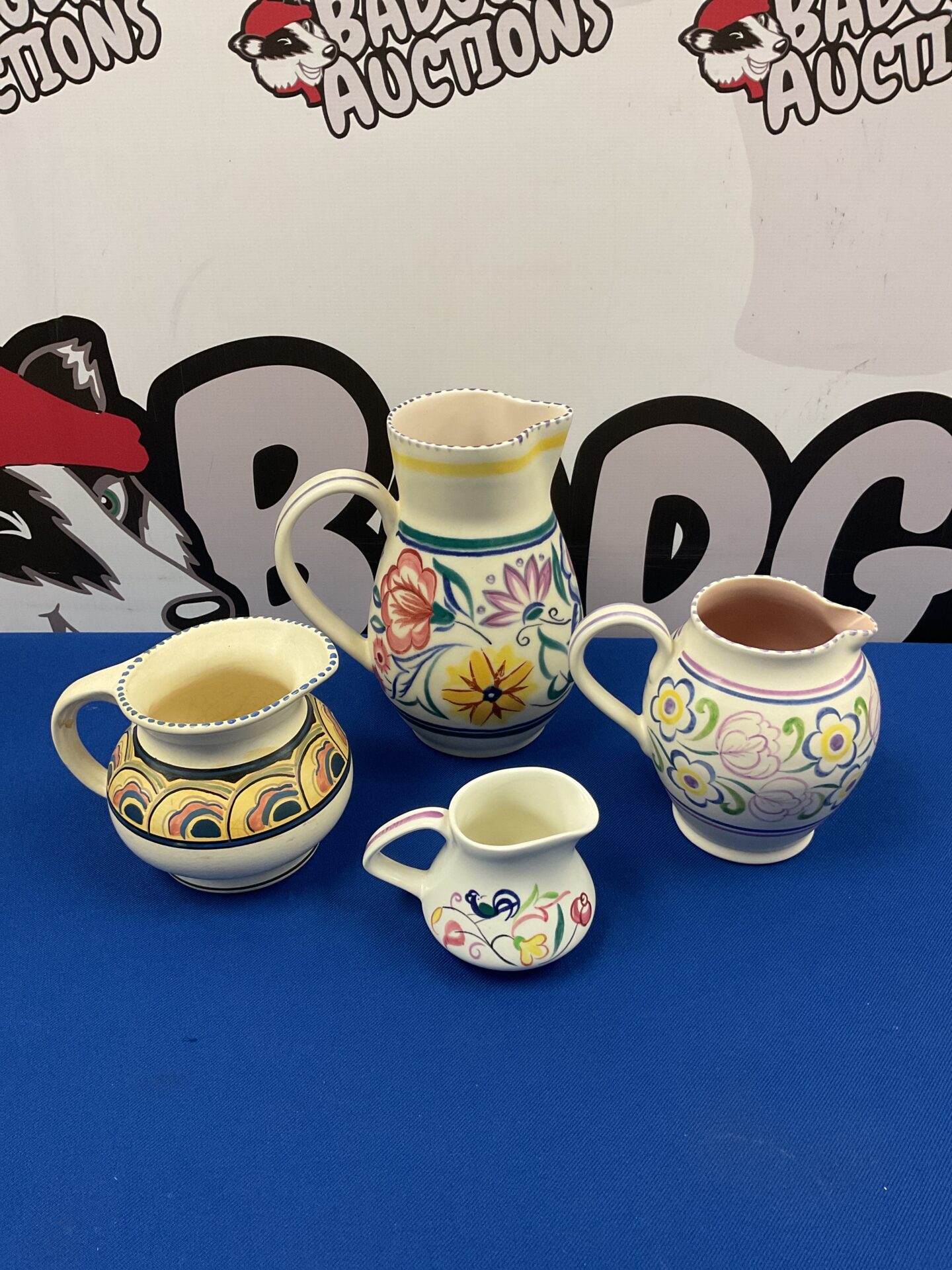 011 Four poole pottery & honiton jugs