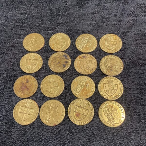 Lot of sixteen antique Georgian gaming tokens, brass counters.