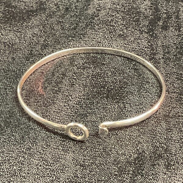 Delicate 925 silver cuff bracelet, minimalist design.
