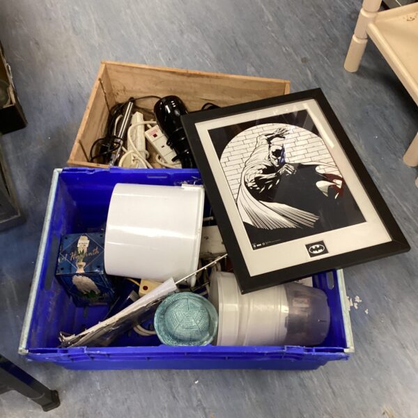 Mixed lot of extension sockets, hair dryer and light bulbs in a blue box.