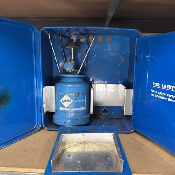 Blue enamel vintage Camping Gaz stove for outdoor cooking.