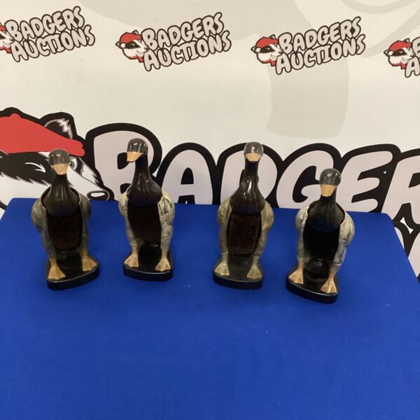 Vintage Bakelite duck brushes, a collectible lot of four.