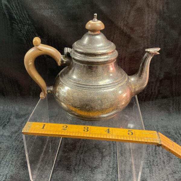 Antique sterling silver teapot by Hemming and Co, London.