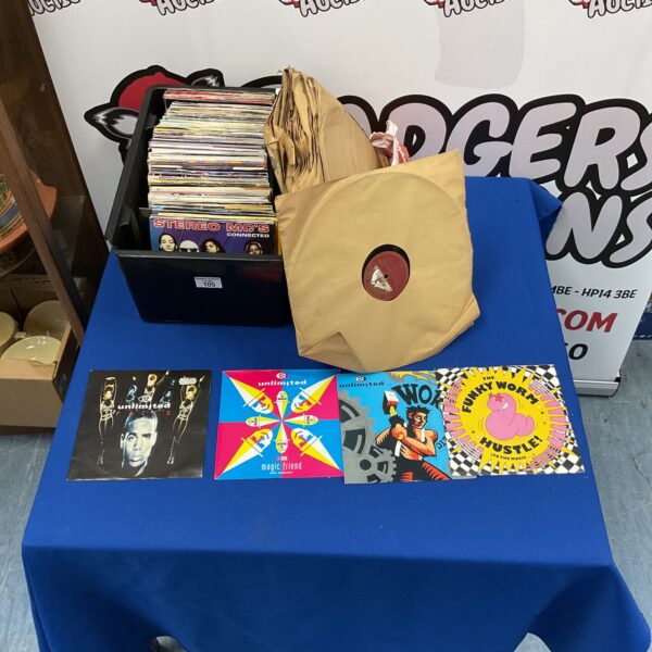 Mixed lot of vintage vinyl records and 12” LPs for collectors.