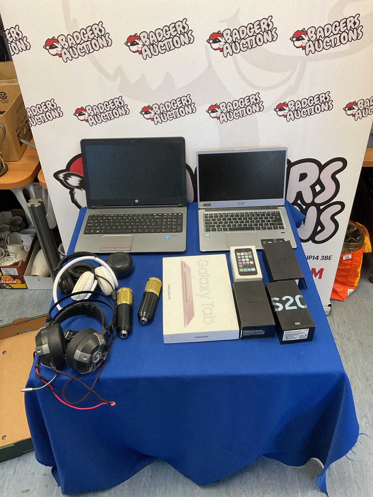 203 HP ProBook, Acer Swift 3 laptop, empty iPhone and Samsung phone and laptop boxes and three pairs of headphones