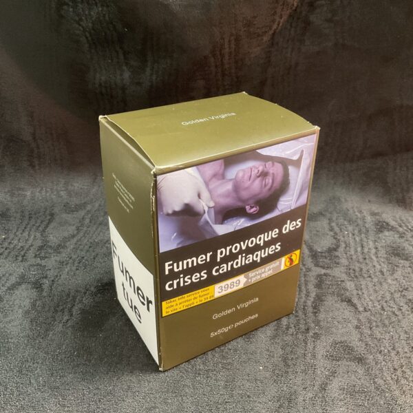 Five unopened pouches of Golden Virginia hand rolling tobacco.