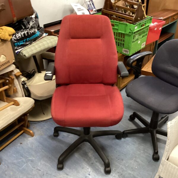 Red office swivel chair with five-star base.
