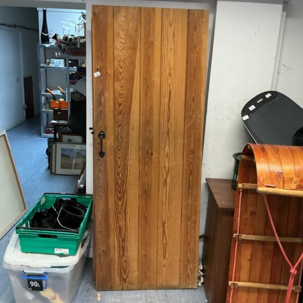 Vintage solid pine interior door with fittings, measuring 78x30 inches.