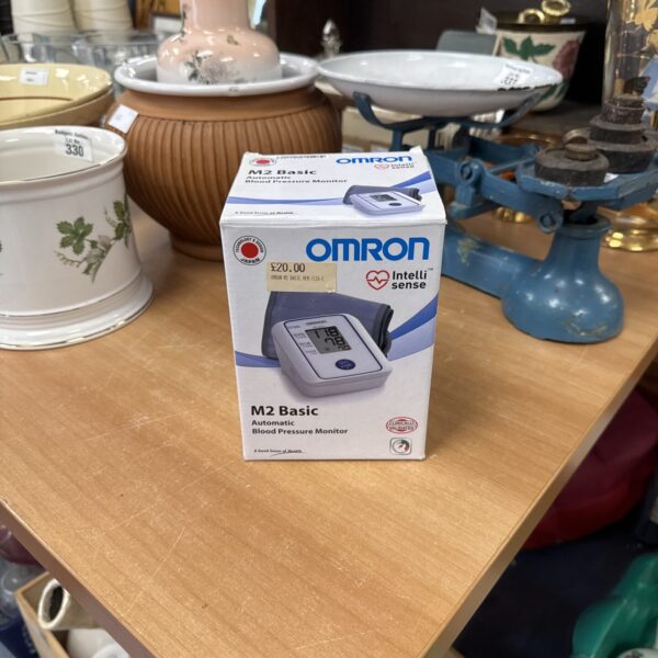 Vintage Omron M2 Basic blood pressure monitor for home health.