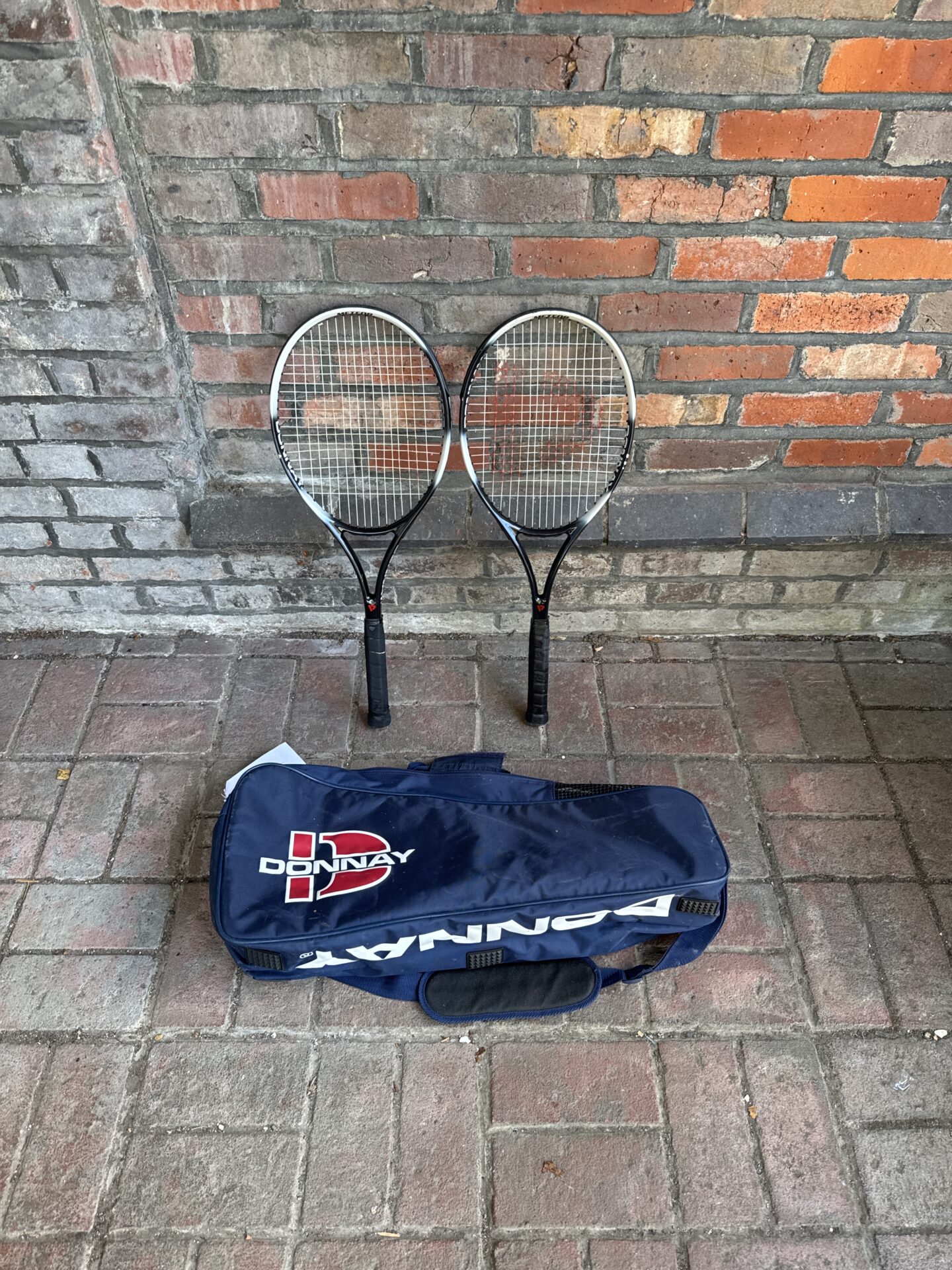 705 Two donnay meteor tennis rackets with bag