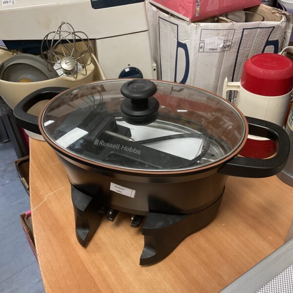 Russell Hobbs slow cooker with ceramic pot, used kitchen appliance.