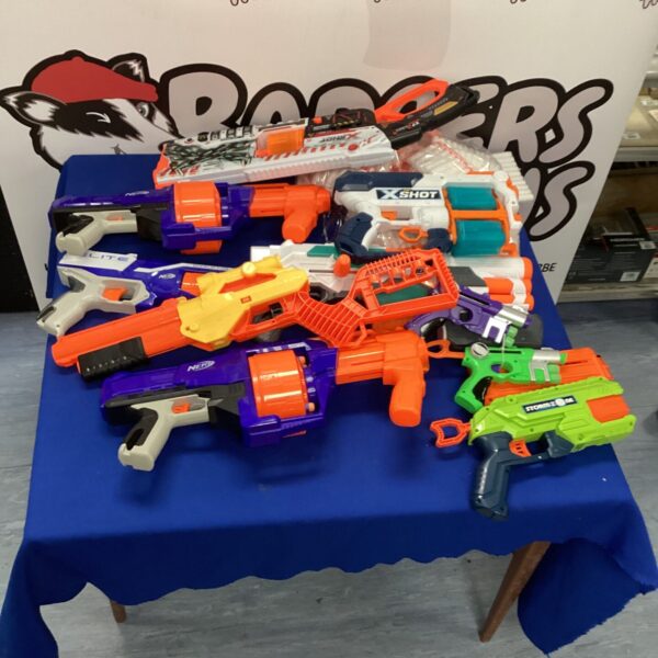 Assortment of Nerf guns and foam darts for active play.