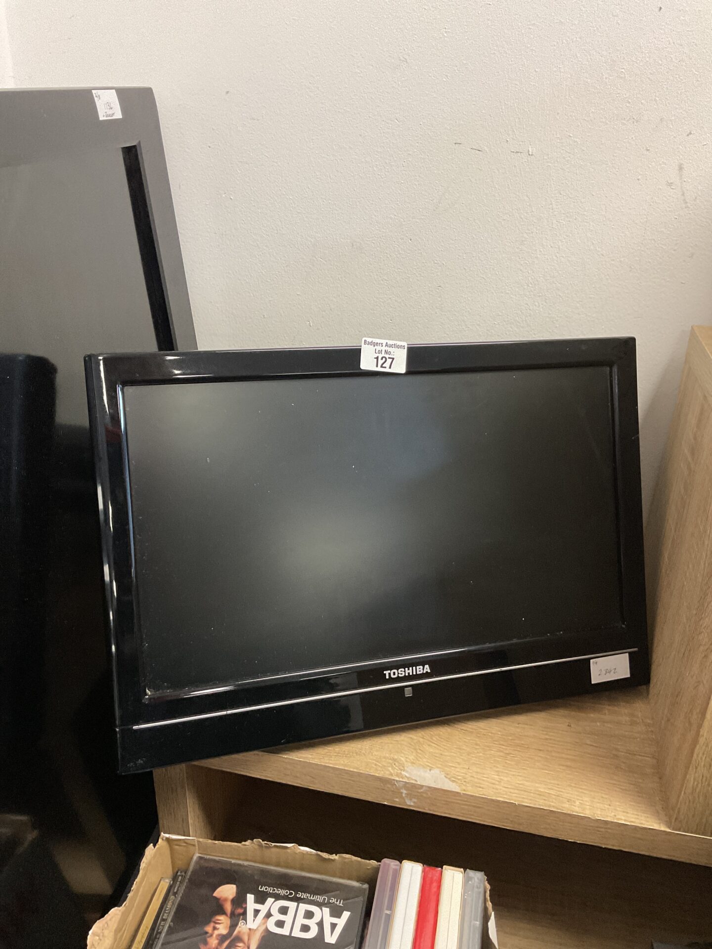 131 Toshiba 18” LCD tv with wall bracket attached