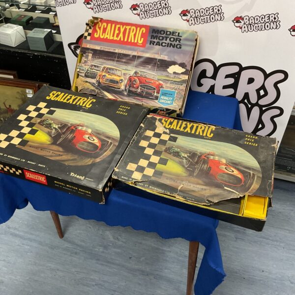 Lot of three vintage Scalextric sets in original boxes.