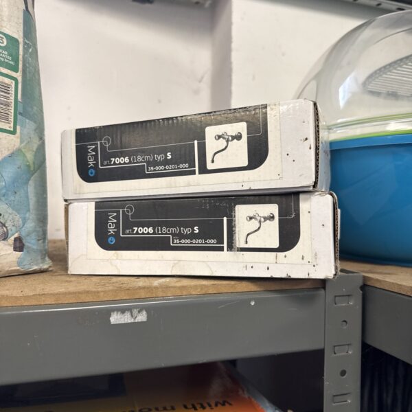 Pair of vintage Mak 18cm bathroom mixer taps in original packaging.