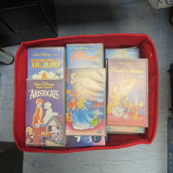 A lot of vintage Disney VHS tapes, including Chitty Chitty Bang Bang.