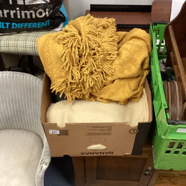 Assorted blankets in a mixed lot, ideal for home decor.