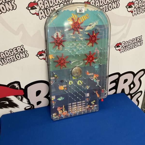 Vintage submarine pinball machine with mechanical scoring system.