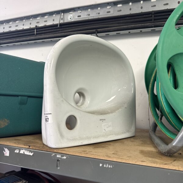 White ceramic hand wash basin for bathroom renovation.