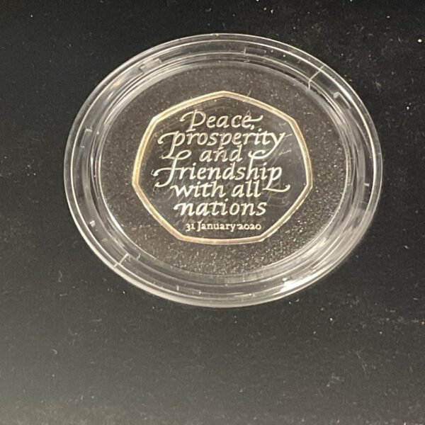 Front view of the UK Brexit 50p proof coin in a capsule.