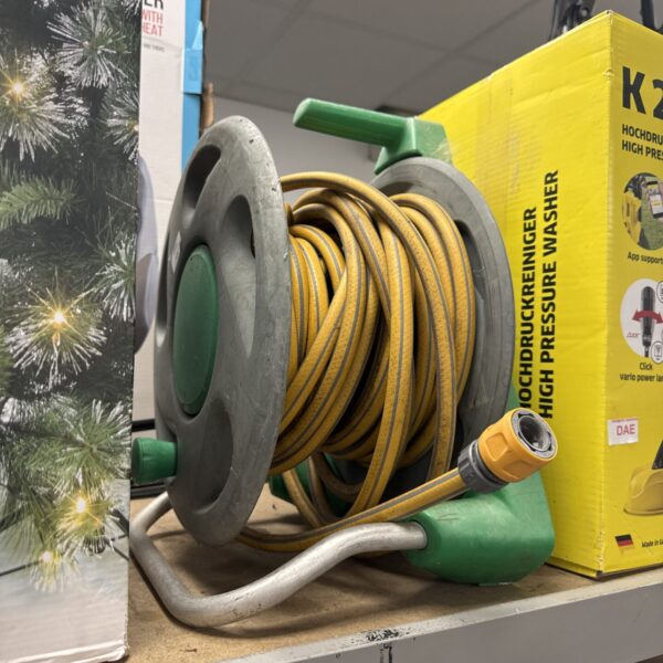Used Hozelock hose reel for garden hose storage.