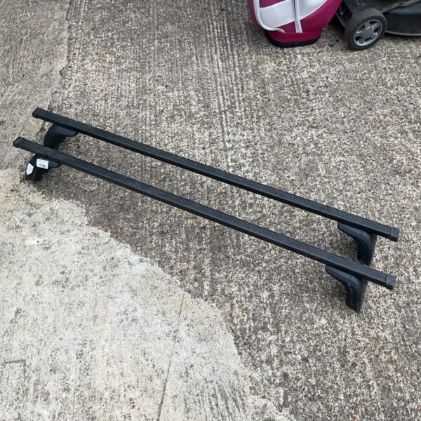 Used Thule car roof bars for vehicle roof transport.