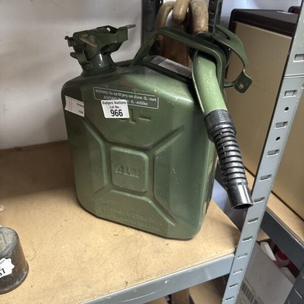 Vintage Alm Jerry Can, a classic metal fuel container.