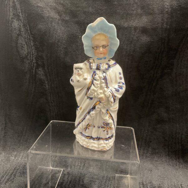 Antique German porcelain figure with nodding head, circa 1900.