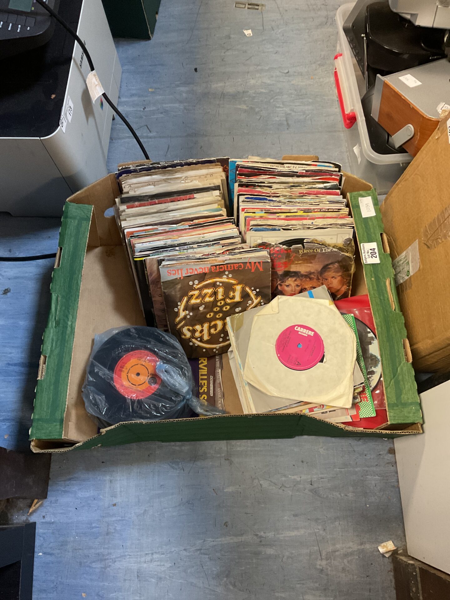 204 Box of mixed 7” vinyl records