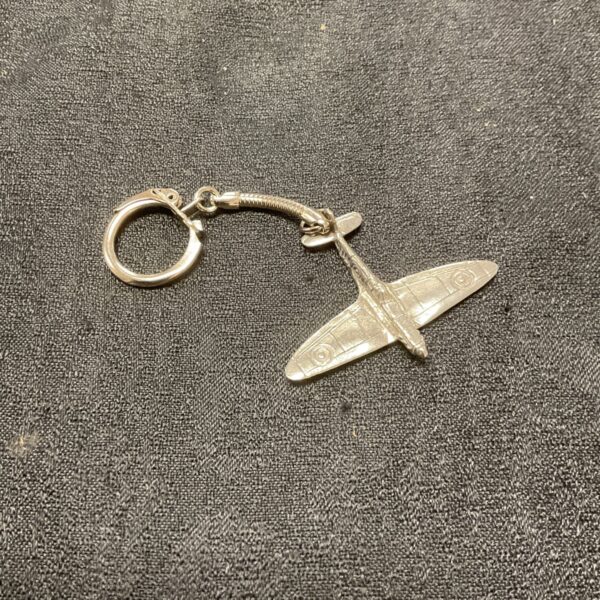 Detailed vintage Spitfire keyring, aviation collectable.