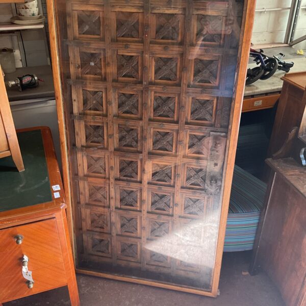 Vintage inlaid coffee table with detailed wood inlay pattern.