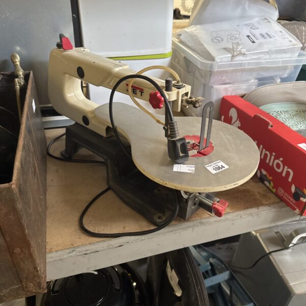 Vintage Jet fret saw for woodworking, showing its metal frame and arm.