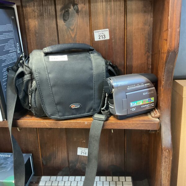 Vintage Samsung digital camcorder in black carry bag.