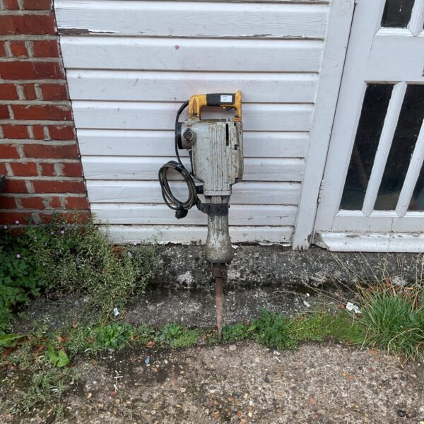 Heavy duty concrete breaker for demolition and construction work.