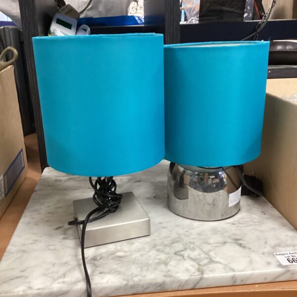 Modern blue touch table lamp with square base.