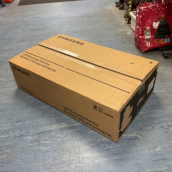 Front view of Samsung UHD Business Monitor in original box.