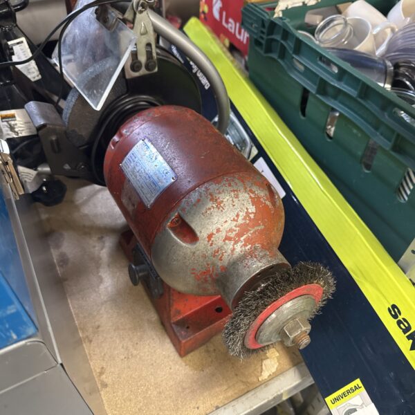 Used Sealey bench grinder with grinding wheel, workshop tool.