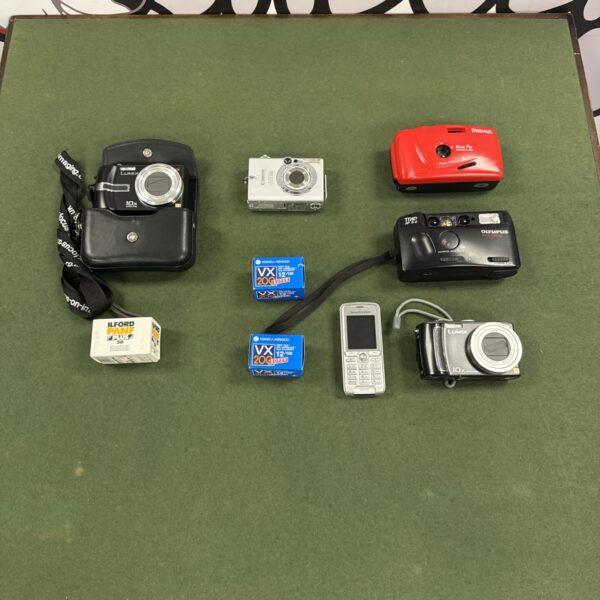 Panasonic Lumix digital camera in a vintage camera lot.