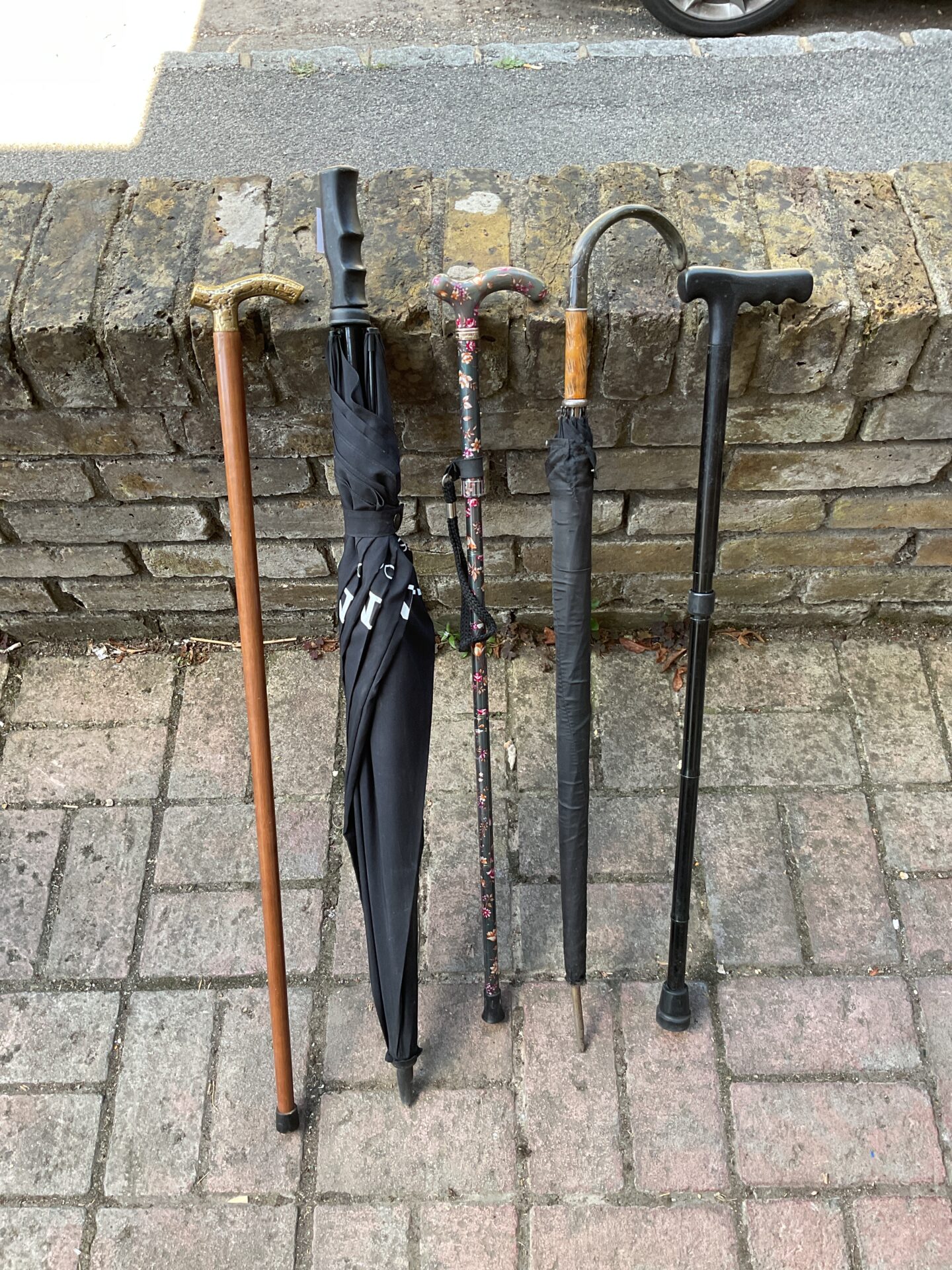 727 Bundle of walking sticks & umbrellas including sony umbrella