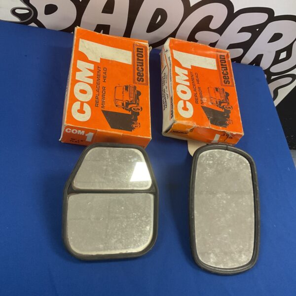 Pair of vintage van mirrors with chrome finish.