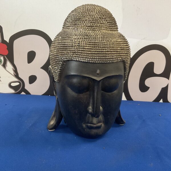Detailed resin Buddha head sculpture for peaceful home decor.