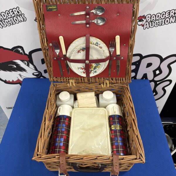 Vintage Brexton thermos picnic basket with red and white details.