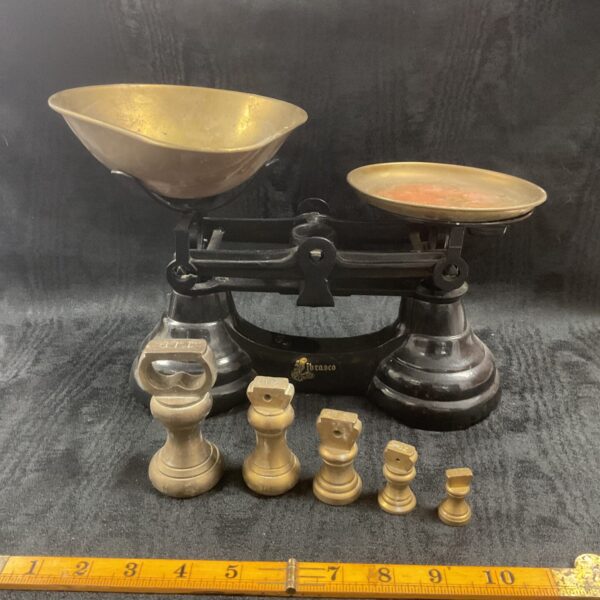 Vintage Librasco kitchen scales with brass weights for measuring.