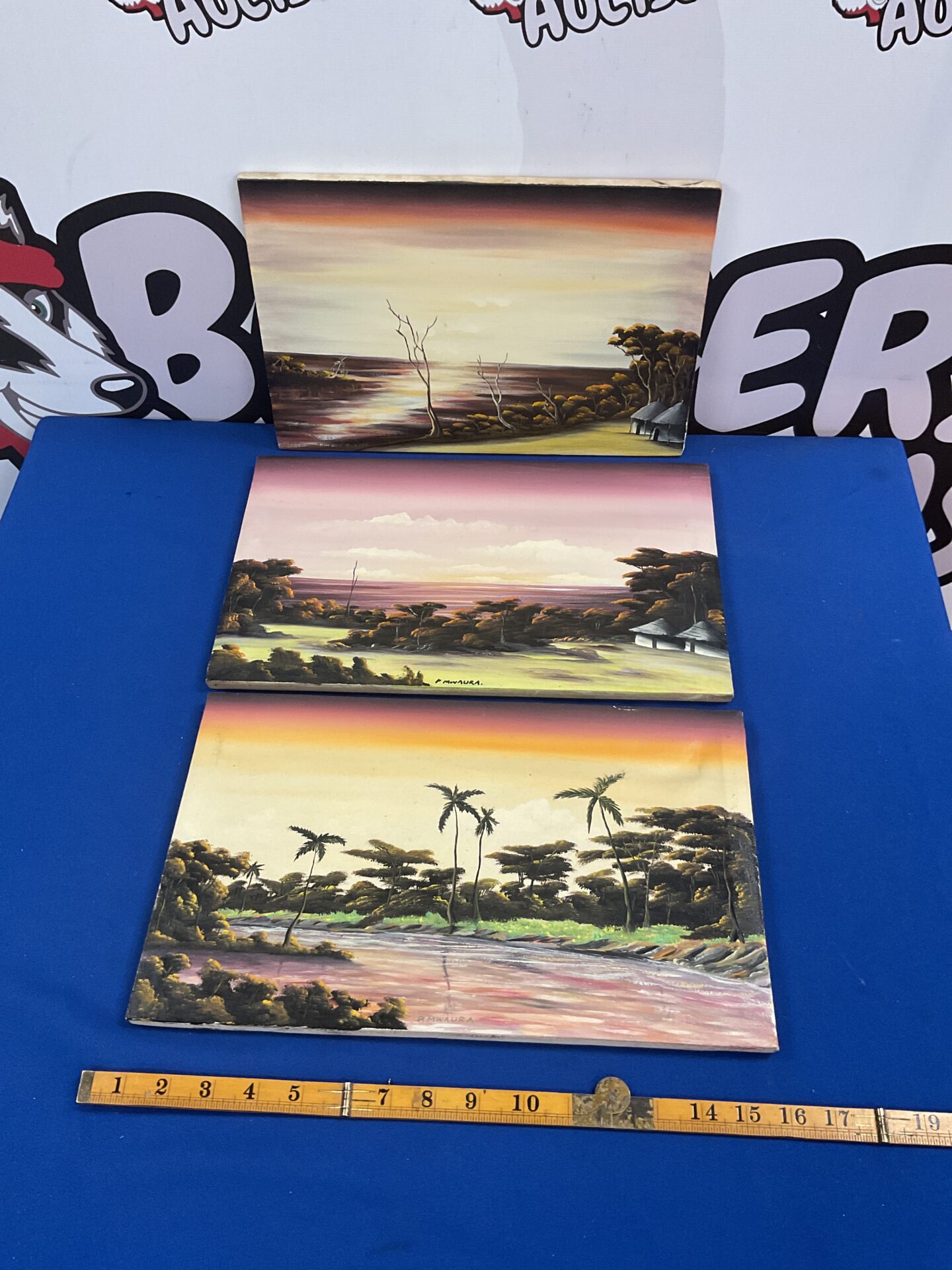 710 Three African oil paintings of African Evening landscapes signed P Mwaura
