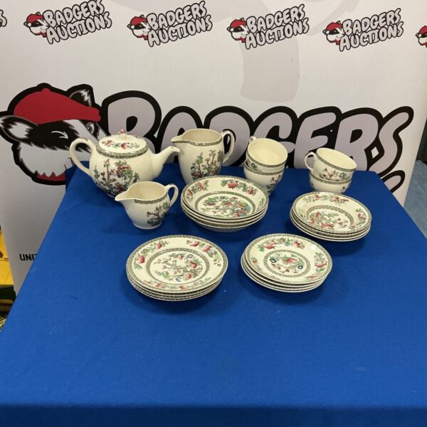 Vintage Johnson Bros Indian Tree china tea set with cups and saucers.