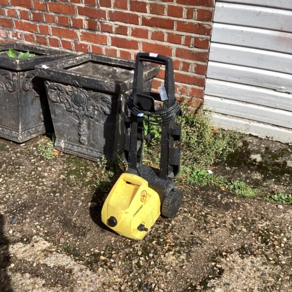 Karcher 300 power washer for garden and patio cleaning.